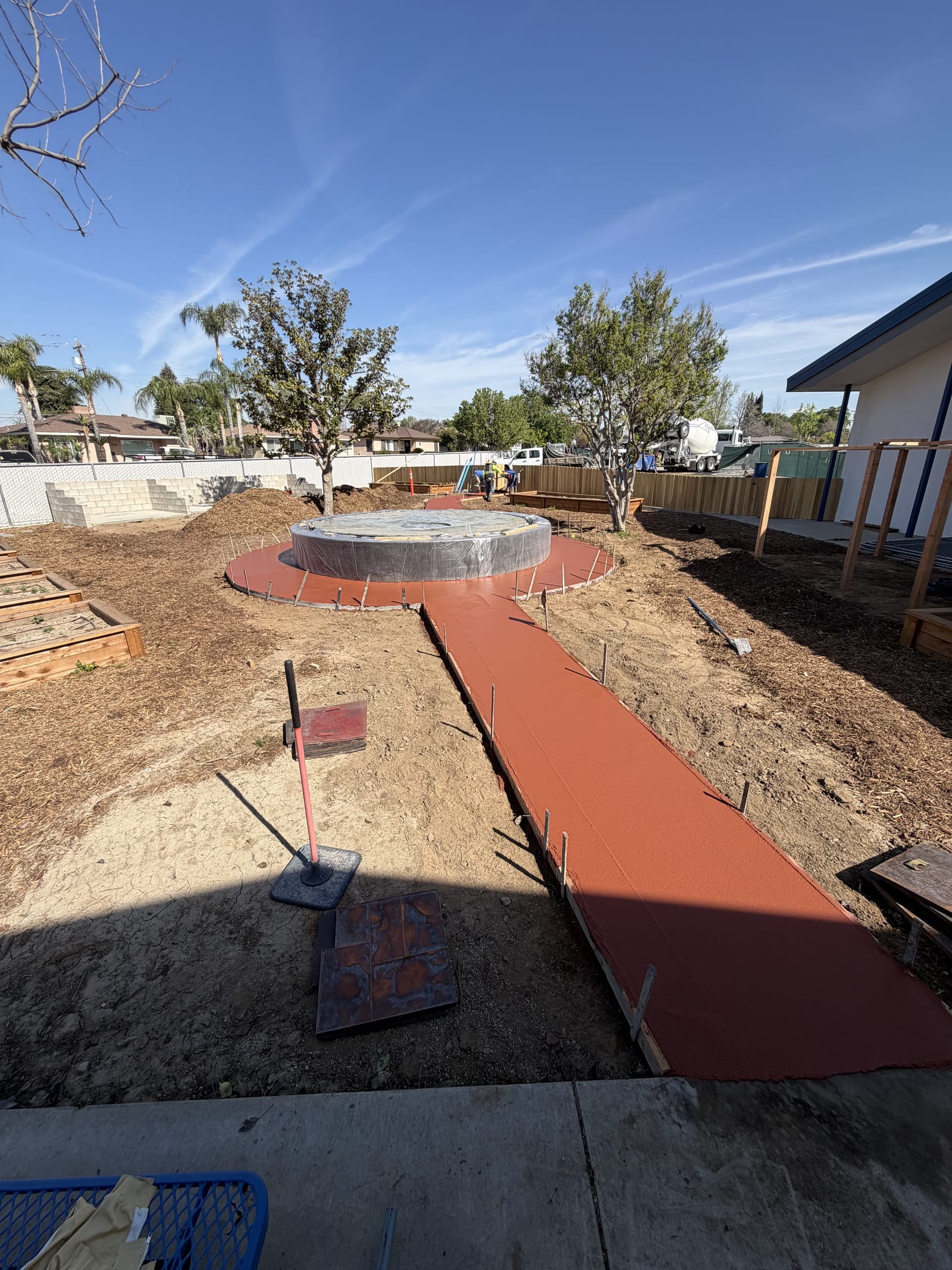 Red Walkway Firepit — decorative concrete work by James Z. Concrete & Construction