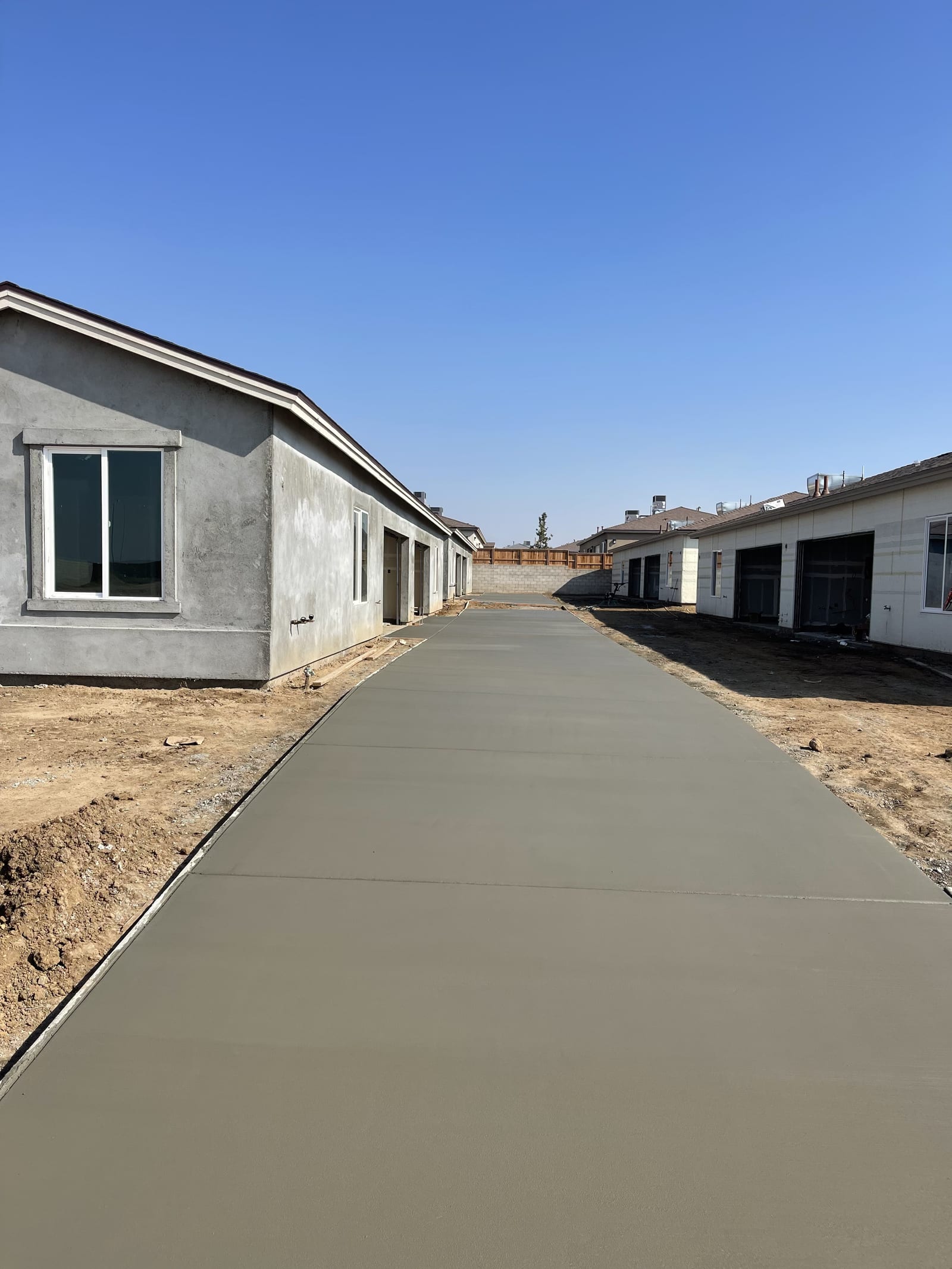 Pathway Between Units — flatwork concrete work by James Z. Concrete & Construction