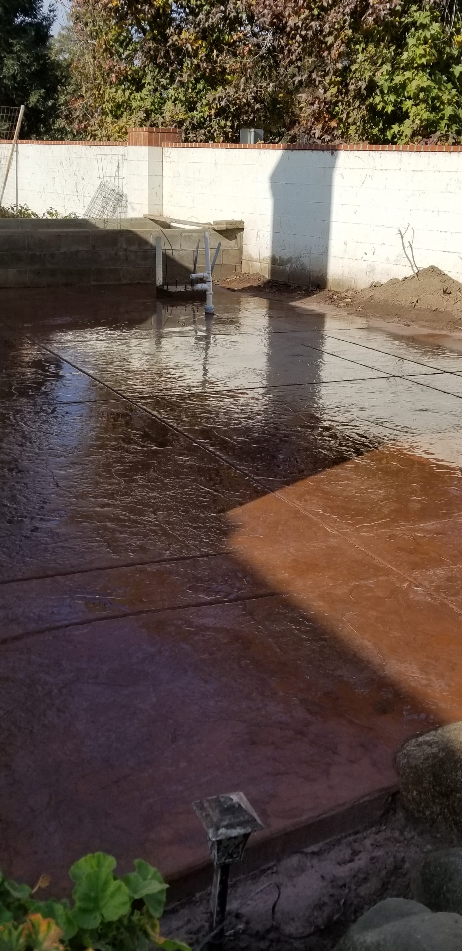 Stained Brown Patio — decorative concrete work by James Z. Concrete & Construction