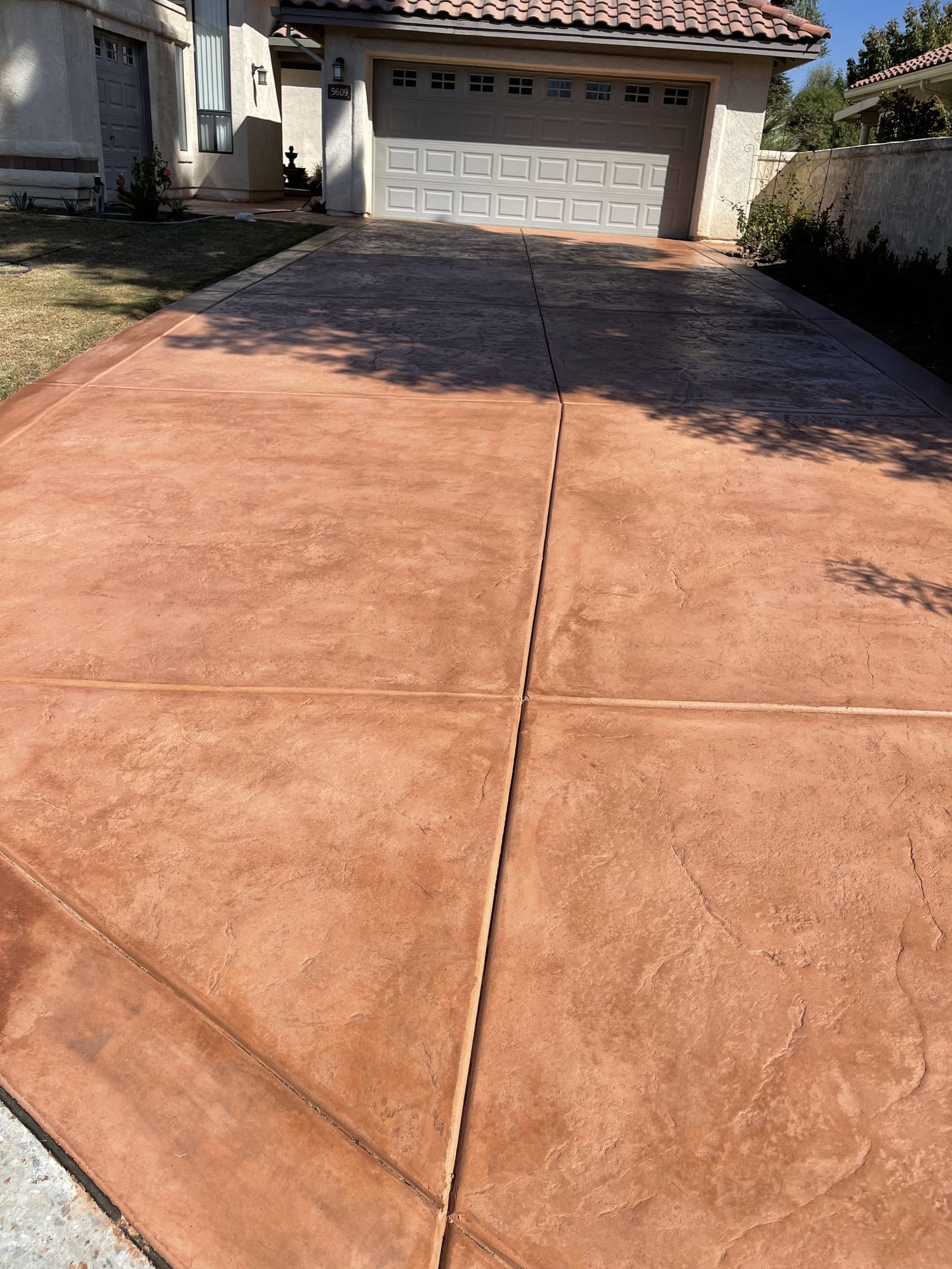 Stained Terracotta Driveway — decorative concrete work by James Z. Concrete & Construction