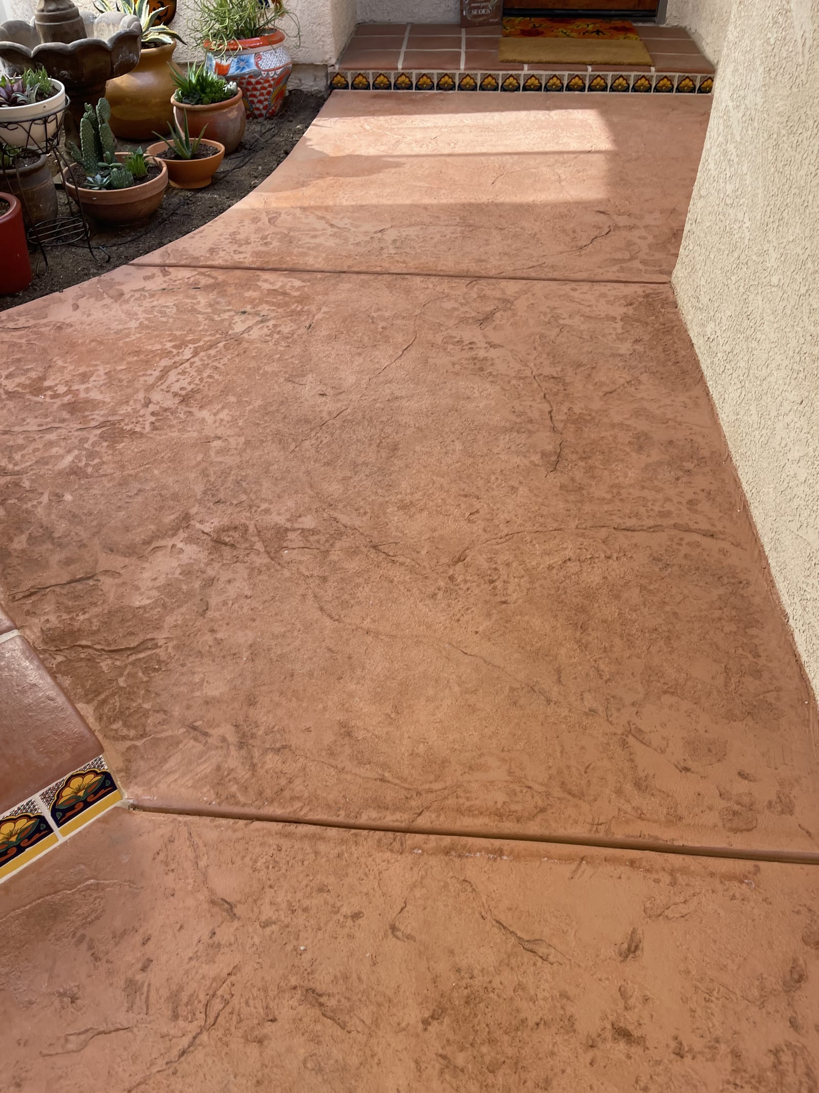 Stained Terracotta Patio — decorative concrete work by James Z. Concrete & Construction